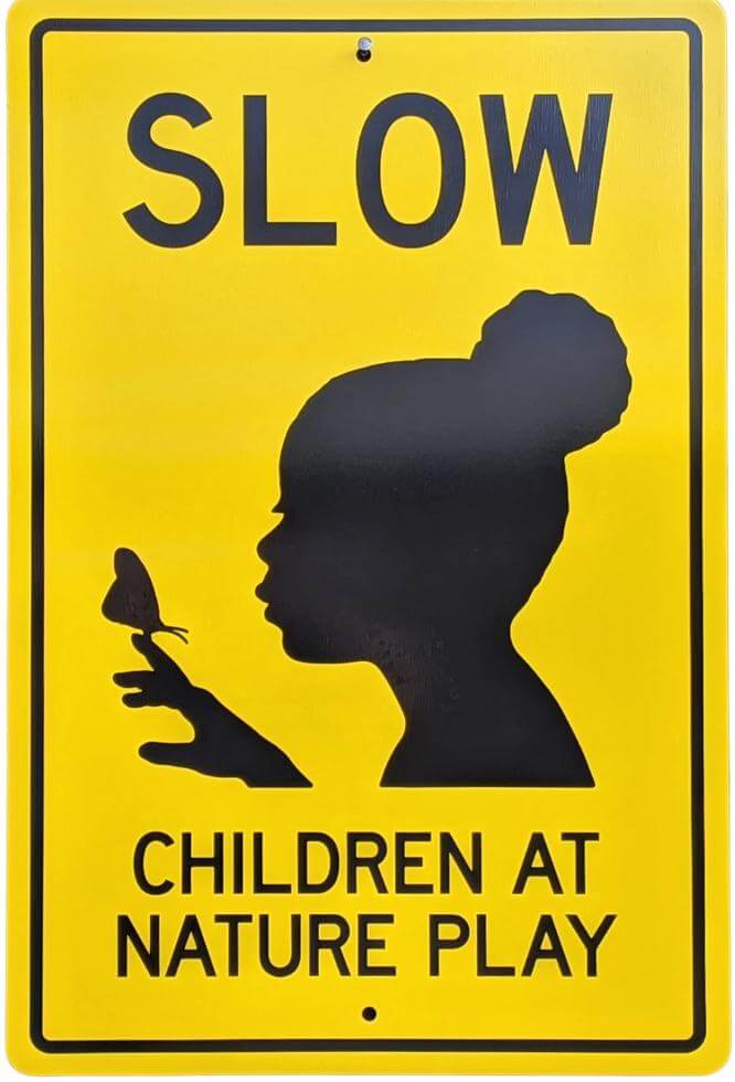 Slow Children at Nature Play sign with girl silouhette 